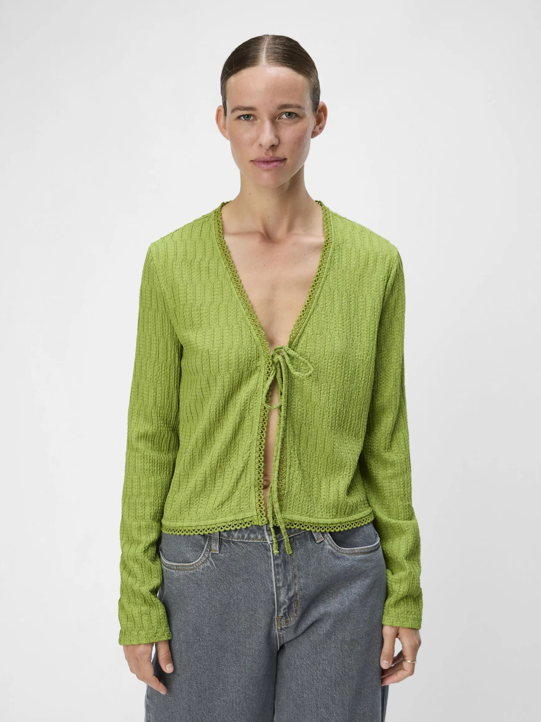 Dame OBJECT BINDELUKNING FORAN TOP